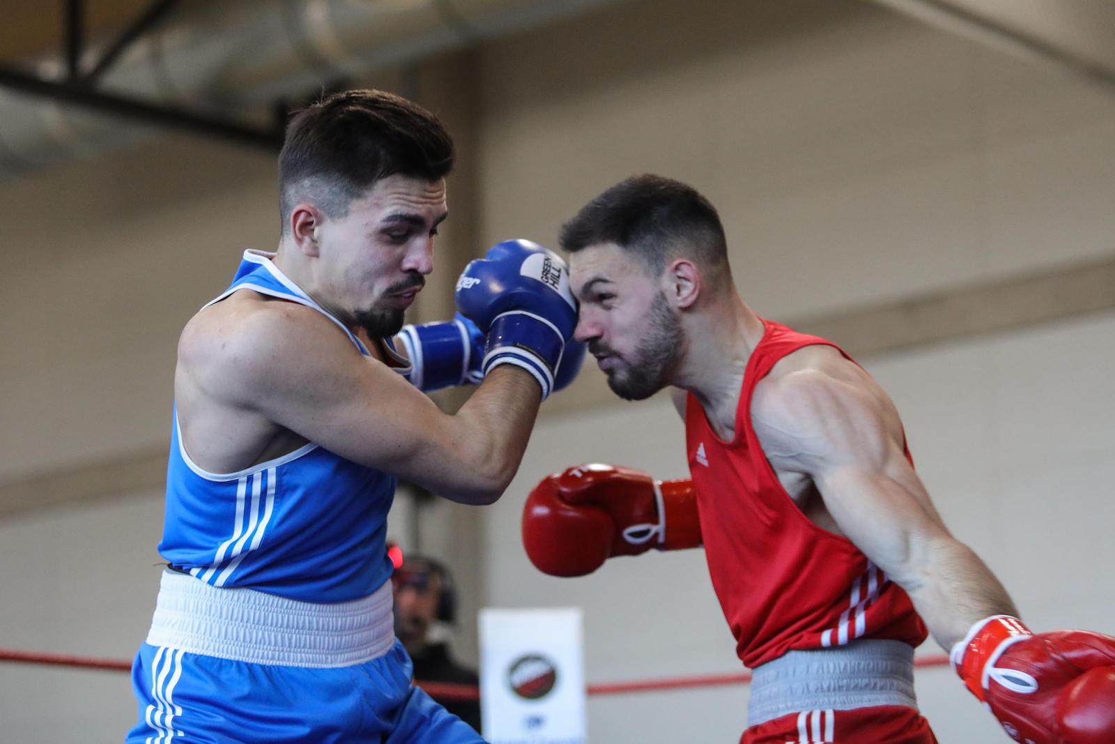 28.01.2024., Sesvete - U OS Jelkovec u Sesvetama odrzano je Finale Prvenstva Hrvatske u boksu. Gabrijel Veocic, Antonio Gabric.  Photo: Tomislav Miletic/PIXSELL