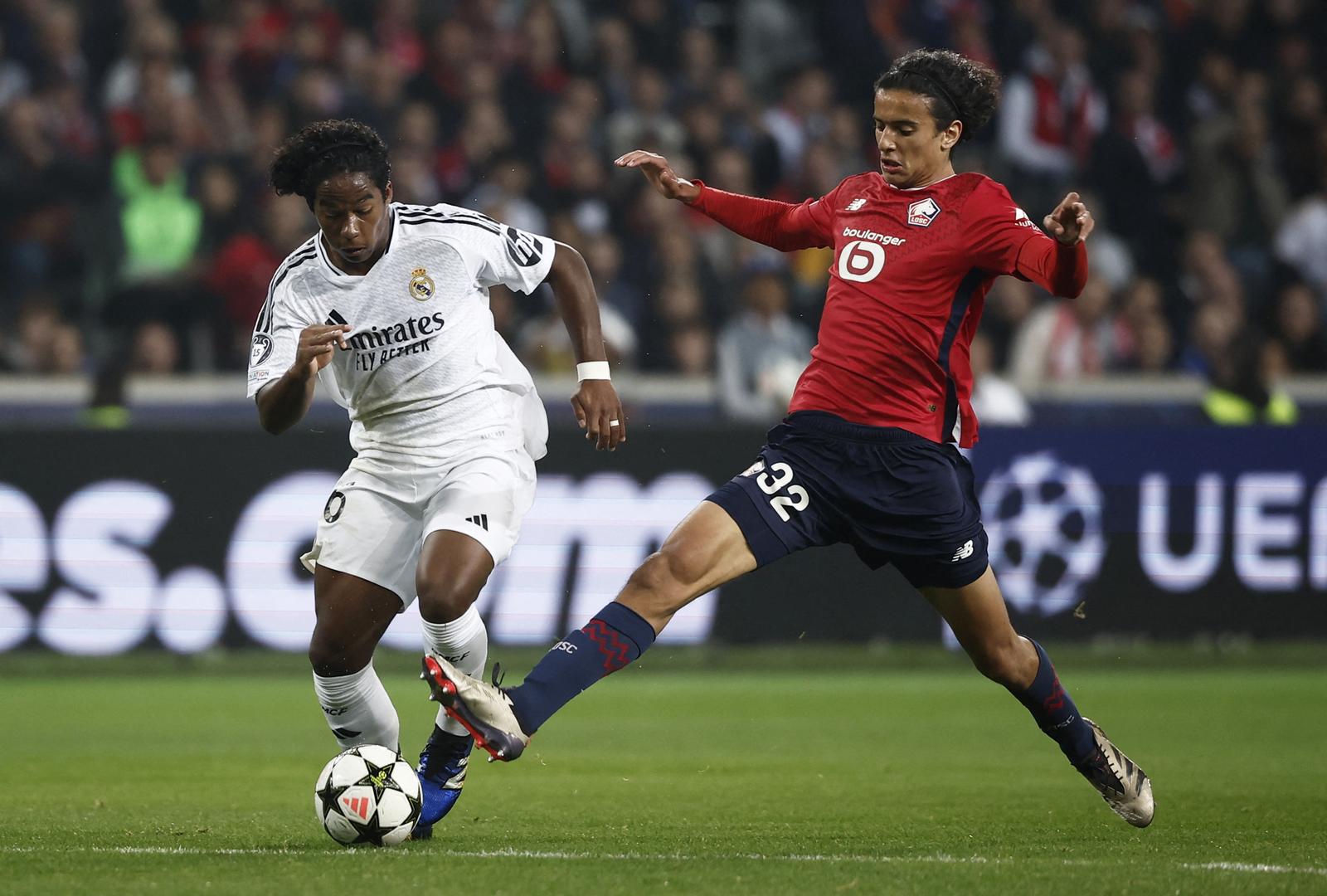 Soccer Football - Champions League - Lille v Real Madrid - Decathlon Arena Stade Pierre-Mauroy, Lille, France - October 2, 2024 Real Madrid's Endrick in action with Lille's Ayyoub Bouaddi REUTERS/Benoit Tessier Photo: BENOIT TESSIER/REUTERS