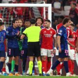 Soccer Football - Champions League - Benfica v Atletico Madrid - Estadio da Luz, Lisbon, Portugal - October 2, 2024 Atletico Madrid's Giuliano Simeone, Jose Maria Gimenez, Reinildo Mandava and Axel Witsel remonstrate with referee Serdar Gozubuyuk REUTERS/Pedro Nunes Photo: PEDRO NUNES/REUTERS