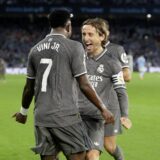 Soccer Football - LaLiga - Celta Vigo v Real Madrid - Estadio de Balaidos, Vigo, Spain - October 19, 2024 Real Madrid's Vinicius Junior celebrates scoring their second goal with Real Madrid's Luka Modric REUTERS/Miguel Vidal Photo: MIGUEL VIDAL/REUTERS