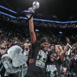 Oct 20, 2024; Brooklyn, New York, USA; New York Liberty forward Jonquel Jones (35) holds up the MVP trophy after defeating the Minnesota Lynx in overtime to win the 2024 WNBA Finals at Barclays Center. Mandatory Credit: Wendell Cruz-Imagn Images Photo: Wendell Cruz/REUTERS