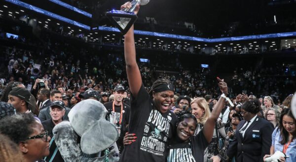 Oct 20, 2024; Brooklyn, New York, USA; New York Liberty forward Jonquel Jones (35) holds up the MVP trophy after defeating the Minnesota Lynx in overtime to win the 2024 WNBA Finals at Barclays Center. Mandatory Credit: Wendell Cruz-Imagn Images Photo: Wendell Cruz/REUTERS