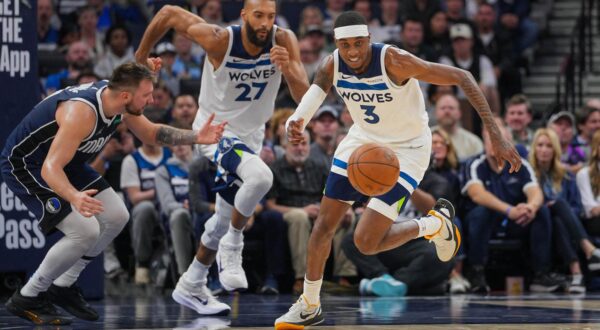 Oct 29, 2024; Minneapolis, Minnesota, USA; Minnesota Timberwolves forward Jaden McDaniels (3) steals the ball from Dallas Mavericks guard Luka Doncic (77) in the second quarter at Target Center. Mandatory Credit: Brad Rempel-Imagn Images Photo: Brad Rempel/REUTERS