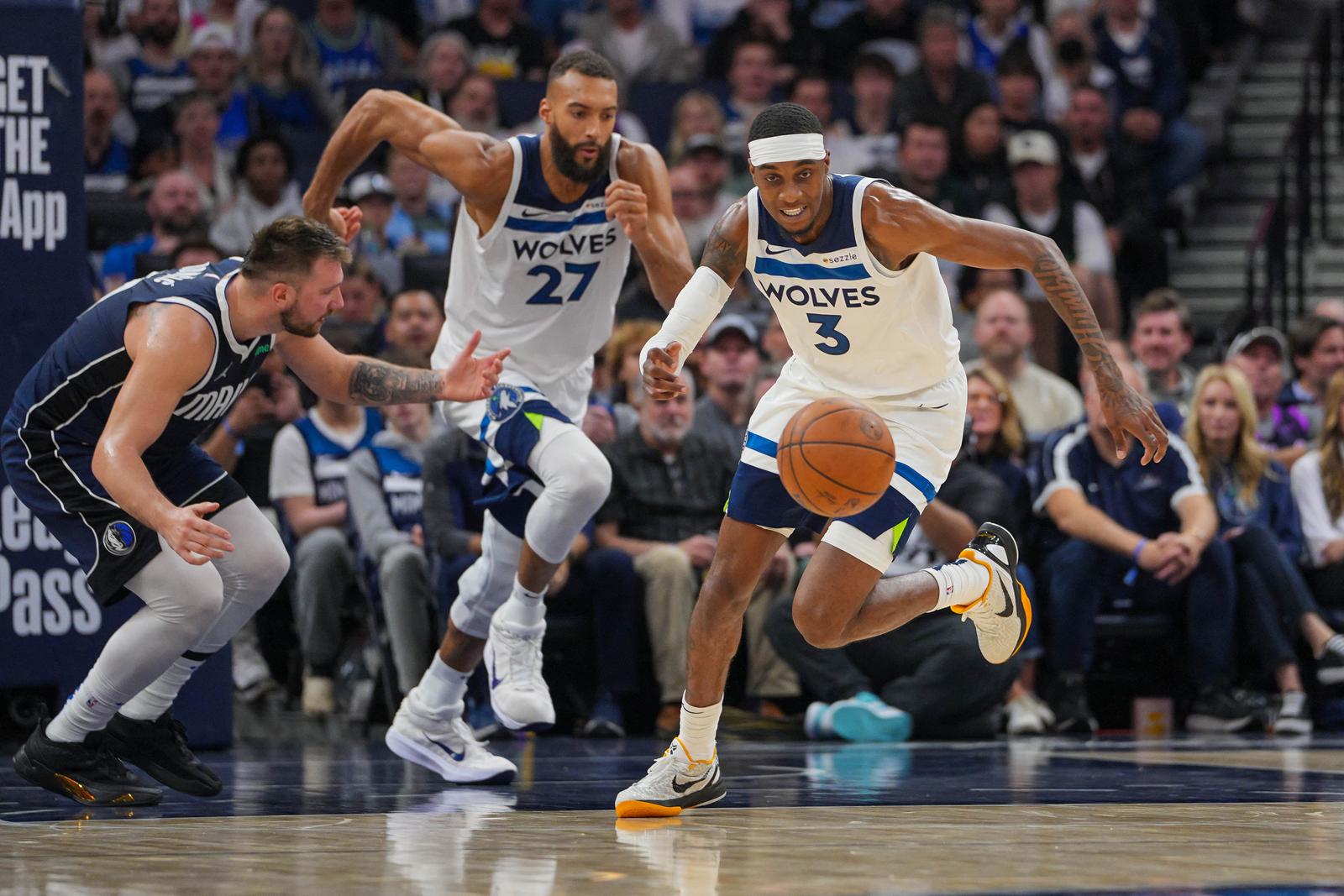 Oct 29, 2024; Minneapolis, Minnesota, USA; Minnesota Timberwolves forward Jaden McDaniels (3) steals the ball from Dallas Mavericks guard Luka Doncic (77) in the second quarter at Target Center. Mandatory Credit: Brad Rempel-Imagn Images Photo: Brad Rempel/REUTERS