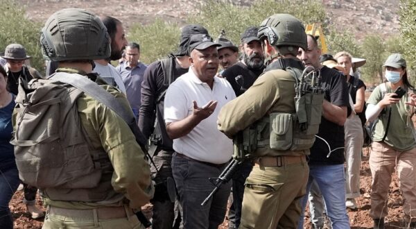 NABLUS, WEST BANK - OCTOBER 15: Israeli soldiers intervene against Palestinian farmers who continue to harvest their olive trees despite Israeli attacks in the village of Qasra and foreign activists who support them in southeast of Nablus, West Bank on October 15, 2024. Issam H.s. Alasmar / Anadolu/ABACAPRESS.COM,Image: 921355235, License: Rights-managed, Restrictions: , Model Release: no, Credit line: AA/ABACA / Abaca Press / Profimedia