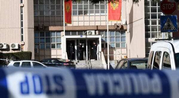 Montenegrin police officers and investigators stand at the entrance to Podgorica County Court, on March 3, 2023. A suicide bomber detonated an explosive device inside the courthouse on March 3, killing himself and injuring 8 persons, two of whom sustained life threatening injuries. The incident happened at Montenegro's Basic Court, a lower judiciary body that handles municipal cases in the capital.,Image: 760102428, License: Rights-managed, Restrictions: , Model Release: no, Credit line: SAVO PRELEVIC / AFP / Profimedia