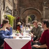 Emily in Paris. (L to R) Lily Collins as Emily, Flavio Furno as Gianni, Eugenio Franceschini as Marcello in episode 409 of Emily in Paris. Cr. Giulia Parmigiani/Netflix © 2024