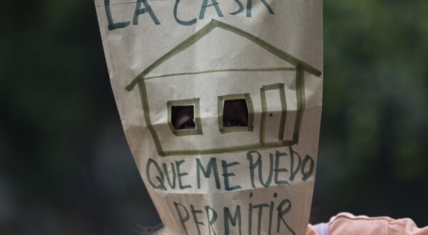 October 13, 2024, Madrid, Madrid, Spain: A woman with a paper bag over her face, which reads in Spanish ''The house I can afford'' during a protest to demand lower rental prices and better rental conditions, which took place in the streets of Madrid.,Image: 920492563, License: Rights-managed, Restrictions: , Model Release: no, Credit line: Luis Soto / Zuma Press / Profimedia