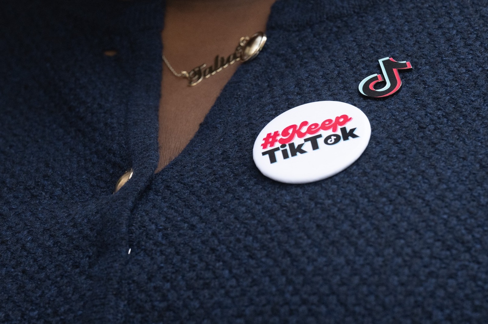 Talia Cadet, a TikTok content creator who sued the US Department of Justice over the TikTok ban, wears a button as she speaks to the media outside the E. Barrett Prettyman US Court House in Washington, DC, September 16, 2024, following oral arguments before an Appeals Court on a potential ban on TikTok in the US. TikTok will attempt to convince a federal court on Monday that a law requiring the video-sharing app to divest from its Chinese ownership or face a ban in the United States is unconstitutional. The fate of Americans' access to TikTok has become a prominent issue in the country's political debate, with Republican presidential candidate Donald Trump opposing any ban of the wildly popular app.,Image: 908437570, License: Rights-managed, Restrictions: , Model Release: no, Credit line: SAUL LOEB / AFP / Profimedia