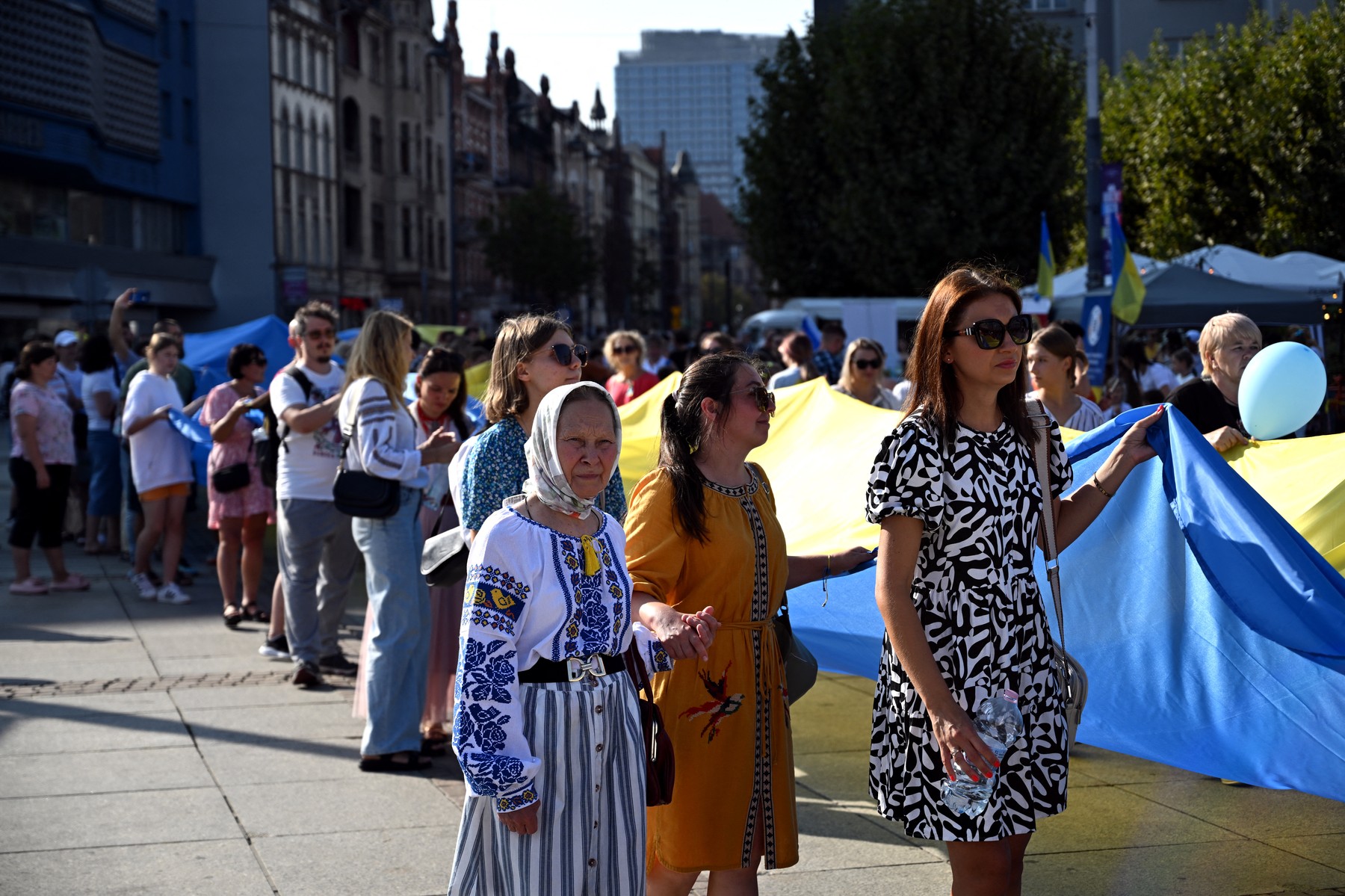 Members of the Ukrainian diaspora unfurl a 100-metre Ukrainian flag to mark the Independence Day of Ukraine in Katowice, Silesian region, on August 24, 2024.,Image: 901257739, License: Rights-managed, Restrictions: , Model Release: no, Credit line: Sergei GAPON / AFP / Profimedia