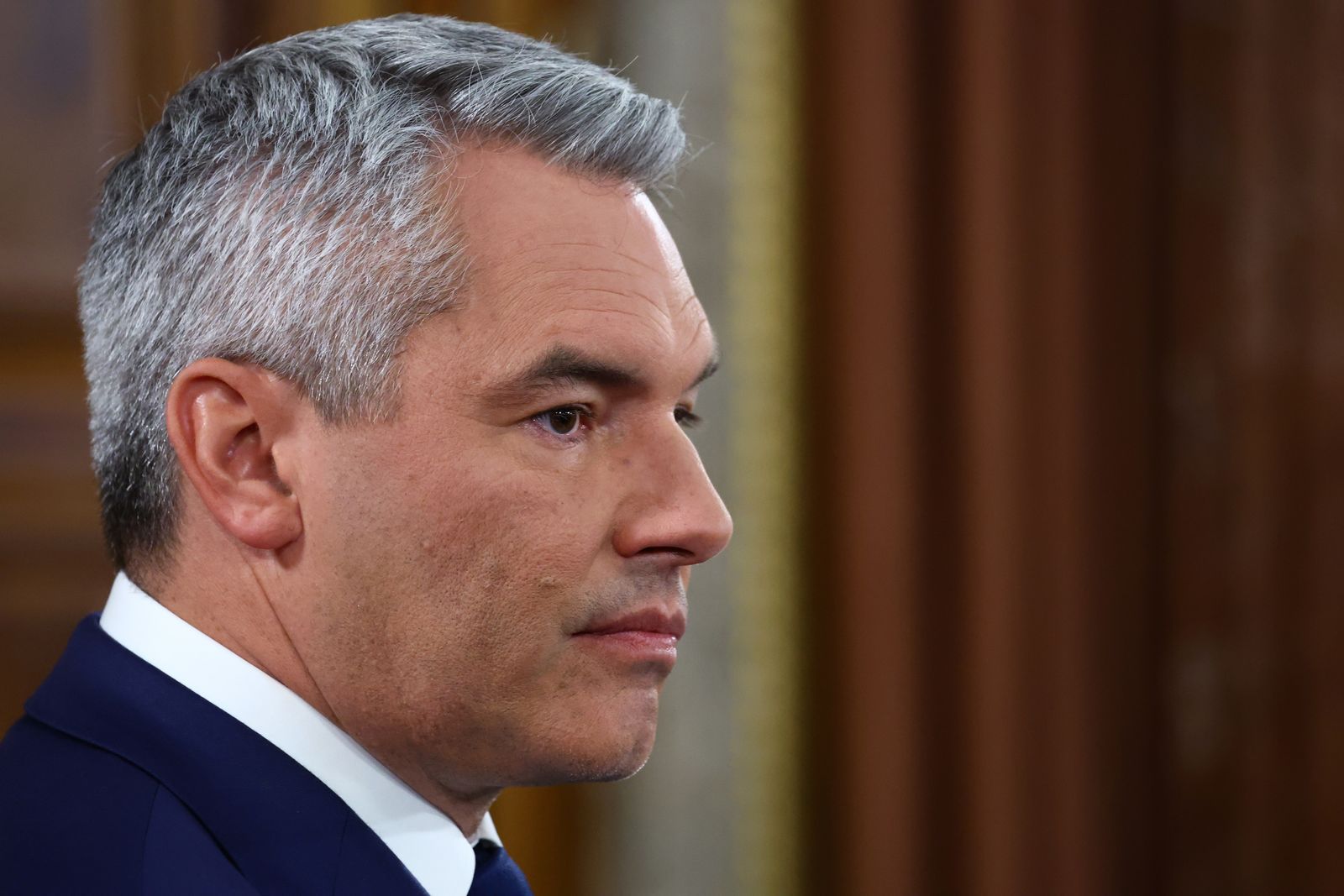 epa11632689 Austrian Chancellor and Head of the Austrian People's Party (OeVP) Karl Nehammer looks on in a TV studio in the Austrian parliament, during parliamentary elections in Vienna, Austria, 29 September 2024. Austria's far-right Freedom Party is heading for an unprecedented general election victory under leader Herbert Kickl, according to projections.  EPA/FILIP SINGER