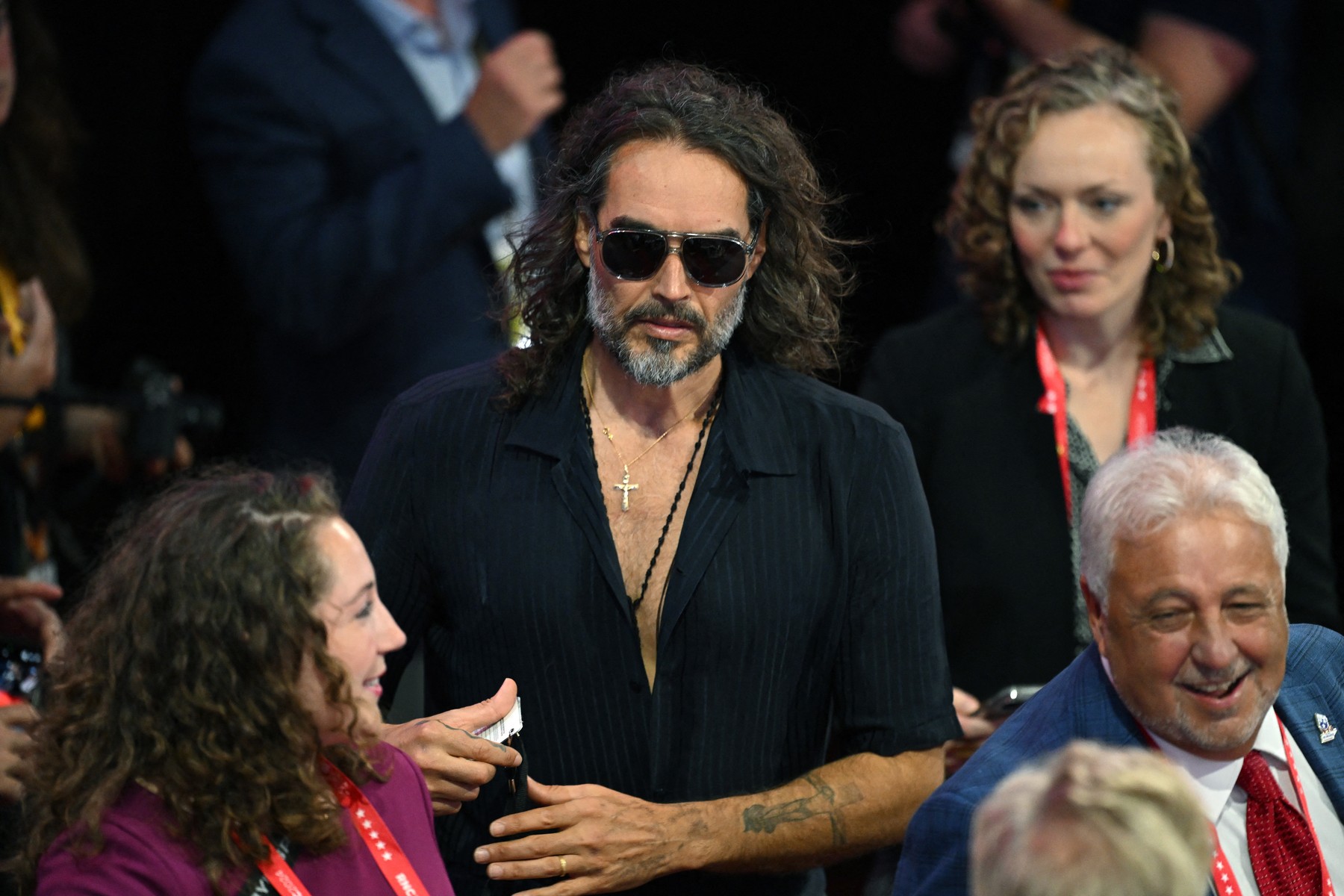 MILWAUKEE, WISCONSIN - JULY 18: Comedian and actor Russell Brand attends the fourth day of the Republican National Convention at the Fiserv Forum on July 18, 2024 in Milwaukee, Wisconsin. Delegates, politicians, and the Republican faithful are in Milwaukee for the annual convention, concluding with former President Donald Trump accepting his party's presidential nomination. The RNC takes place from July 15-18.   Leon Neal,Image: 890724268, License: Rights-managed, Restrictions: , Model Release: no, Credit line: LEON NEAL / Getty images / Profimedia