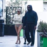 Los Angeles, CA  - *PREMIUM-EXCLUSIVE*  - Rapper Kanye West and wife Bianca Censori had a blast on a family outing, whisking his daughter North West away to catch the highly anticipated new 'Deadpool & Wolverine' movie in Los Angeles. 

Bianca only went half conservative in her outfit as she wore a long-sleeved shirt with nude underwear to match. It's been noted that Bianca has been asked to cover up her provocative outfits when around the children. 

Bianca also played up to her step-mom role as she was seen hugging her arms around North West before heading into iPic to catch the movie. The newly anticipated Marvel film 'Deadpool & Wolverine' is also rated R for mature adult scenes making a questionable choice for their 11-year-old daughter to accompany. Shot on 07/27/24

*UK Clients - Pictures Containing Children
Please Pixelate Face Prior To Publication*,Image: 893472638, License: Rights-managed, Restrictions: , Model Release: no, Pictured: Kanye West, North West, Bianca Censori, Credit line: Blackbelts / BACKGRID / Backgrid USA / Profimedia