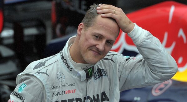 (FILES) In this file photo taken on November 25, 2012 then German Formula One driver Michael Schumacher gestures at the end of Brazil's F1 Grand Prix at the Interlagos racetrack in Sao Paulo, Brazil.  German prosecutors said on September 25, 2024 they were bringing charges against three men arrested this year over a blackmail plot targeting the family of Formula One legend Michael Schumacher. They said the chief suspect, a 53-year-old man from the western German city of Wuppertal, had threatened to release private photos and videos and demanded 15 million euros (USD 16.7 million) from Schumacher's family. These allegedly included images of the seven-time Formula One champion before and after the 2013 skiing accident in the French Alps which left him with a serious brain injury.,Image: 911750491, License: Rights-managed, Restrictions: , Model Release: no, Credit line: Yasuyoshi CHIBA / AFP / Profimedia