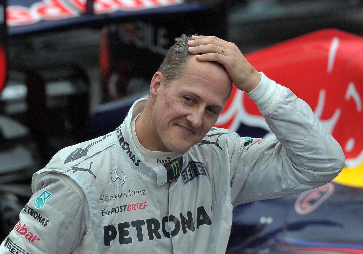 (FILES) In this file photo taken on November 25, 2012 then German Formula One driver Michael Schumacher gestures at the end of Brazil's F1 Grand Prix at the Interlagos racetrack in Sao Paulo, Brazil.  German prosecutors said on September 25, 2024 they were bringing charges against three men arrested this year over a blackmail plot targeting the family of Formula One legend Michael Schumacher. They said the chief suspect, a 53-year-old man from the western German city of Wuppertal, had threatened to release private photos and videos and demanded 15 million euros (USD 16.7 million) from Schumacher's family. These allegedly included images of the seven-time Formula One champion before and after the 2013 skiing accident in the French Alps which left him with a serious brain injury.,Image: 911750491, License: Rights-managed, Restrictions: , Model Release: no, Credit line: Yasuyoshi CHIBA / AFP / Profimedia