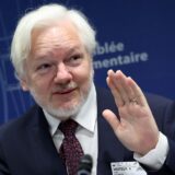 WikiLeaks founder Julian Assange waves as he arrives to attend a parliamentary hearing at the Council of Europe in Strasbourg, eastern France, on October 1, 2024.,Image: 914543482, License: Rights-managed, Restrictions: , Model Release: no, Credit line: FREDERICK FLORIN / AFP / Profimedia