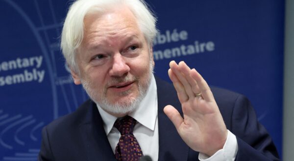 WikiLeaks founder Julian Assange waves as he arrives to attend a parliamentary hearing at the Council of Europe in Strasbourg, eastern France, on October 1, 2024.,Image: 914543482, License: Rights-managed, Restrictions: , Model Release: no, Credit line: FREDERICK FLORIN / AFP / Profimedia