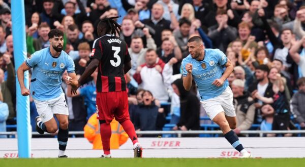 Manchester City's Mateo Kovacic (right) celebrates scoring their side's first goal of the game during the Premier League match at the Etihad Stadium, Manchester. Picture date: Saturday October 5, 2024.,Image: 916770575, License: Rights-managed, Restrictions: EDITORIAL USE ONLY No use with unauthorised audio, video, data, fixture lists, club/league logos or "live" services. Online in-match use limited to 120 images, no video emulation. No use in betting, games or single club/league/player publications., Model Release: no, Credit line: Martin Rickett / PA Images / Profimedia