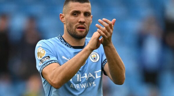 Manchester City's Croatian midfielder #08 Mateo Kovacic applauds fans on the pitch after the English Premier League football match between Manchester City and Fulham at the Etihad Stadium in Manchester, north west England, on October 5, 2024. City won the game 3-2.,Image: 916797130, License: Rights-managed, Restrictions: RESTRICTED TO EDITORIAL USE. No use with unauthorized audio, video, data, fixture lists, club/league logos or 'live' services. Online in-match use limited to 120 images. An additional 40 images may be used in extra time. No video emulation. Social media in-match use limited to 120 images. An additional 40 images may be used in extra time. No use in betting publications, games or single club/league/player publications., Model Release: no, Credit line: Oli SCARFF / AFP / Profimedia