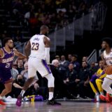 PALM SPRINGS, CALIFORNIA - OCTOBER 06: LeBron James #23 of the Los Angeles Lakers sets a screen for Bronny James #9 against Tyus Jones #21 of the Phoenix Suns during the second quarter at Acrisure Arena on October 06, 2024 in Palm Springs, California.,Image: 917501152, License: Rights-managed, Restrictions: , Model Release: no, Credit line: Katelyn Mulcahy / Getty images / Profimedia