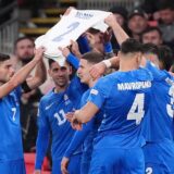 Greece players hold aloft a shirt in memory of George Baldock after Evangelos Pavlidis scores the opening goal of the game during the UEFA Nations League Group B2 match at Wembley Stadium, London. Picture date: Thursday October 10, 2024.,Image: 919225826, License: Rights-managed, Restrictions: Use subject to FA restrictions. Editorial use only. Commercial use only with prior written consent of the FA. No editing except cropping., Model Release: no, Credit line: John Walton / PA Images / Profimedia