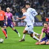 Germany's midfielder #17 Florian Wirtz (R) reacts as he fights for the ball with Bosnia and Herzegovina's defender #18 Nikola Katic (L) and Bosnia and Herzegovina's midfielder #15 Armin Gigovic (C)  during the UEFA Nations League, League A - Group 3, football match between Bosnia and Herzegovina and Germany at the Bilino Polje Stadium in Zenica, on October 11, 2024.,Image: 919763979, License: Rights-managed, Restrictions: , Model Release: no, Credit line: Elvis Barukcic / AFP / Profimedia