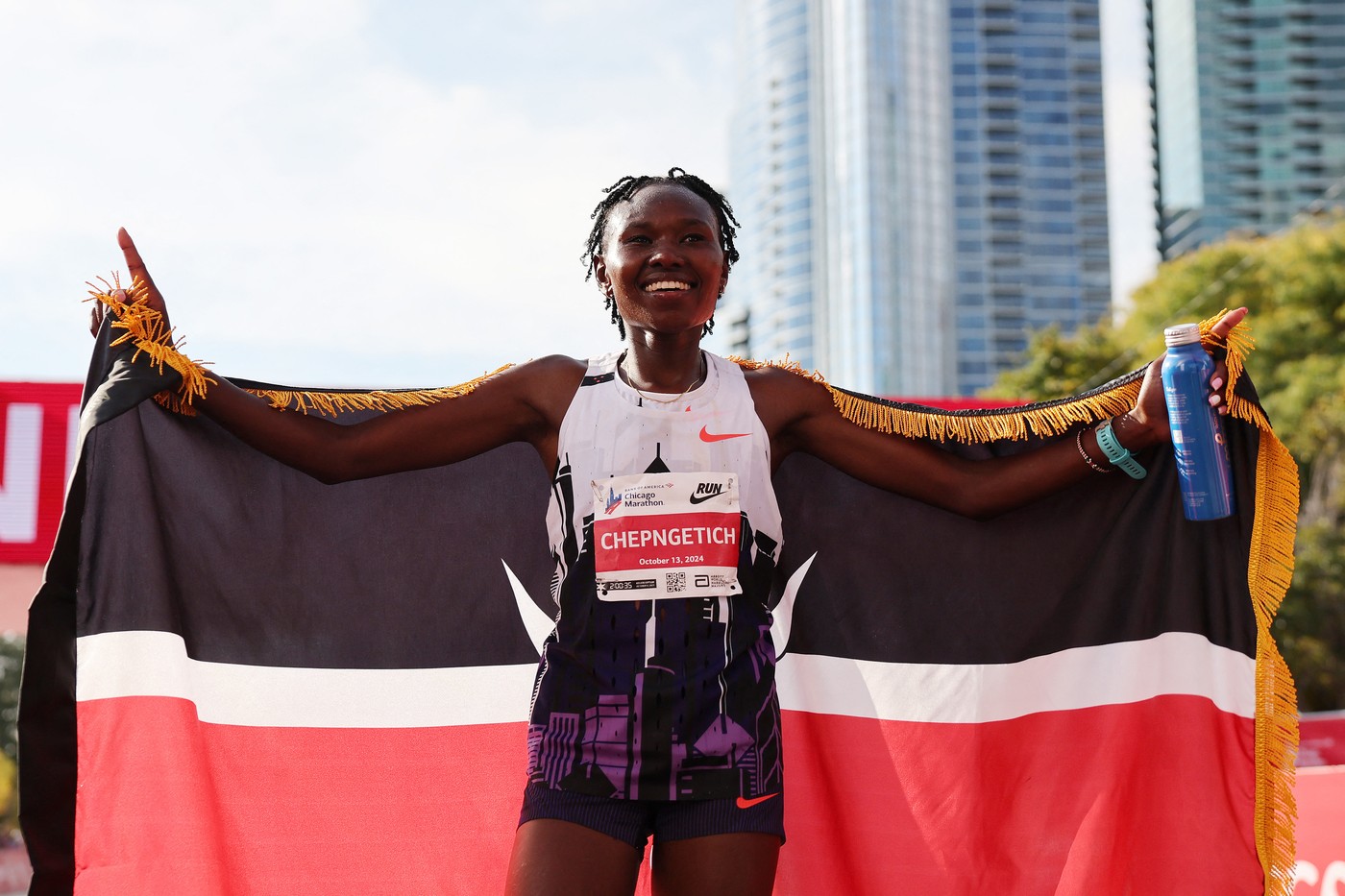 CHICAGO, ILLINOIS - OCTOBER 13: Ruth Chepngetich of Kenya celebrates after crossing the finish line to win the 2024 Chicago Marathon professional women's division and set a new world record with a time of 2:09:56 at Grant Park on October 13, 2024 in Chicago, Illinois.   Michael Reaves,Image: 920526838, License: Rights-managed, Restrictions: , Model Release: no, Credit line: Michael Reaves / Getty images / Profimedia