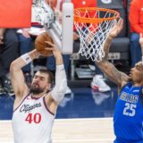 October 14, 2024, Inglewood, California, USA: Los Angeles Clippers' Ivica Zubac #40 grabs a rebound agents Dallas Mavericks' P.J. Washington Jr. #25 during an NBA preseason basketball game at Intuit Dome on Monday, Oct. 14, 2024 in Inglewood, California.,Image: 921219788, License: Rights-managed, Restrictions: , Model Release: no, Credit line: Ringo Chiu / Zuma Press / Profimedia