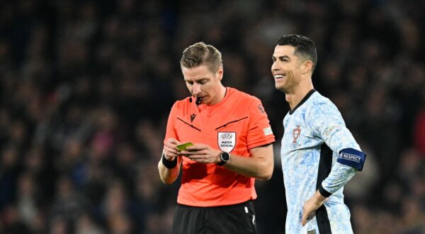 Portugal's forward #07 Cristiano Ronaldo (R) talks to the referee during the UEFA Nations League, League A Group A1 football match between Scotland and Portugal at Hampden Park Stadium in Glasgow, on October 15, 2024.,Image: 921551119, License: Rights-managed, Restrictions: , Model Release: no, Credit line: ANDY BUCHANAN / AFP / Profimedia