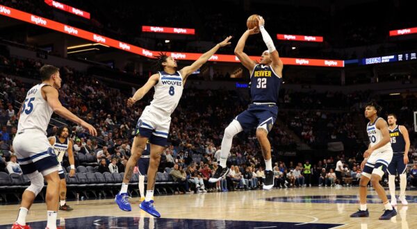 MINNEAPOLIS, MINNESOTA - OCTOBER 17: Aaron Gordon #32 of the Denver Nuggets shoots the ball against Josh Minott #8 of the Minnesota Timberwolves in the third quarter of a preseason game at Target Center on October 17, 2024 in Minneapolis, Minnesota. The Nuggets defeated the Timberwolves 132-126.,Image: 922754431, License: Rights-managed, Restrictions: , Model Release: no, Credit line: David Berding / Getty images / Profimedia