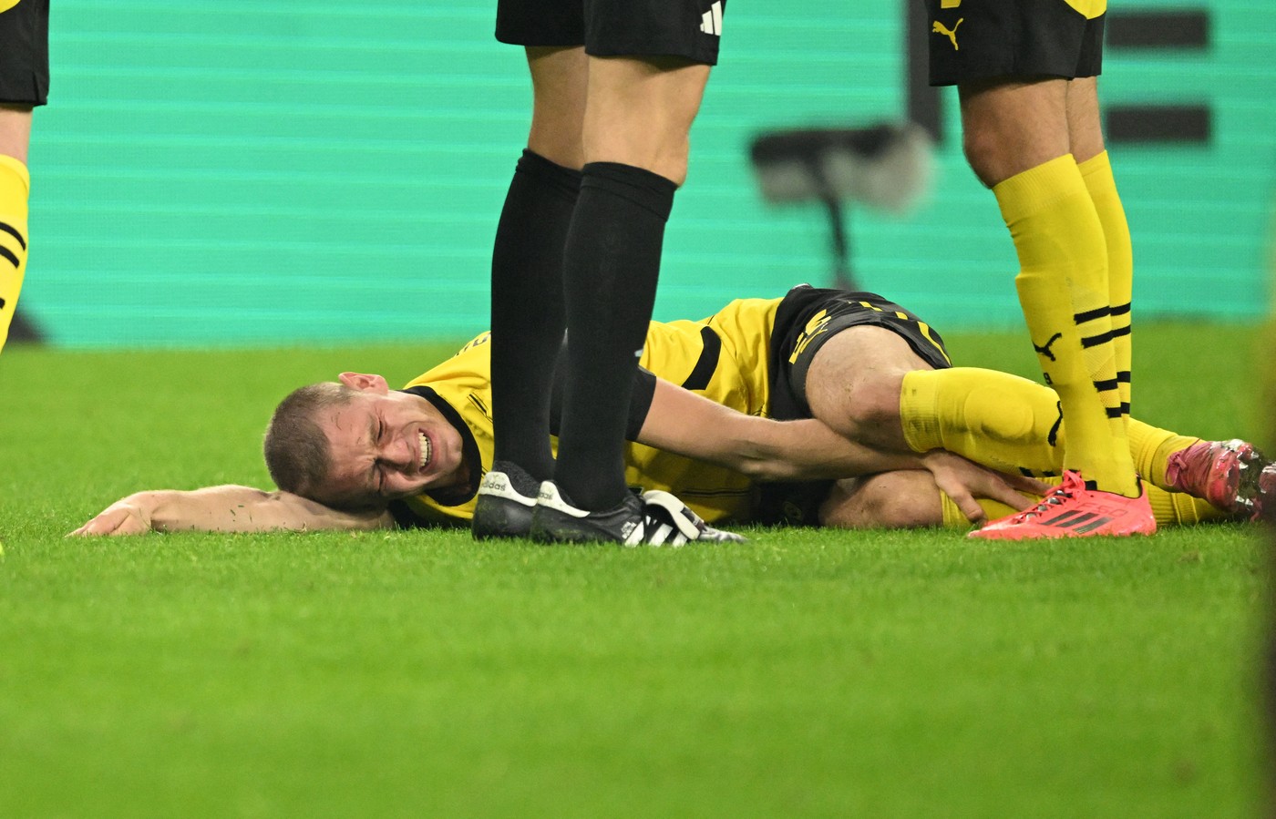 Dortmund's Norwegian defender #26 Julian Ryerson is injured during the German first division Bundesliga football match between Borussia Dortmund and St Pauli in Dortmund, western Germany on October 18, 2024.,Image: 923115394, License: Rights-managed, Restrictions: , Model Release: no, Credit line: Ina FASSBENDER / AFP / Profimedia