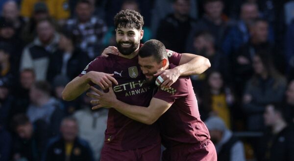 Manchester City's Croatian defender #24 Josko Gvardiol celebrates scoring the team's first goal alongside Manchester City's Croatian midfielder #08 Mateo Kovacic (L) during the English Premier League football match between Wolverhampton Wanderers and Manchester City at the Molineux stadium in Wolverhampton, central England on October 20, 2024.,Image: 923924159, License: Rights-managed, Restrictions: RESTRICTED TO EDITORIAL USE. No use with unauthorized audio, video, data, fixture lists, club/league logos or 'live' services. Online in-match use limited to 120 images. An additional 40 images may be used in extra time. No video emulation. Social media in-match use limited to 120 images. An additional 40 images may be used in extra time. No use in betting publications, games or single club/league/player publications., Model Release: no, Credit line: Adrian Dennis / AFP / Profimedia