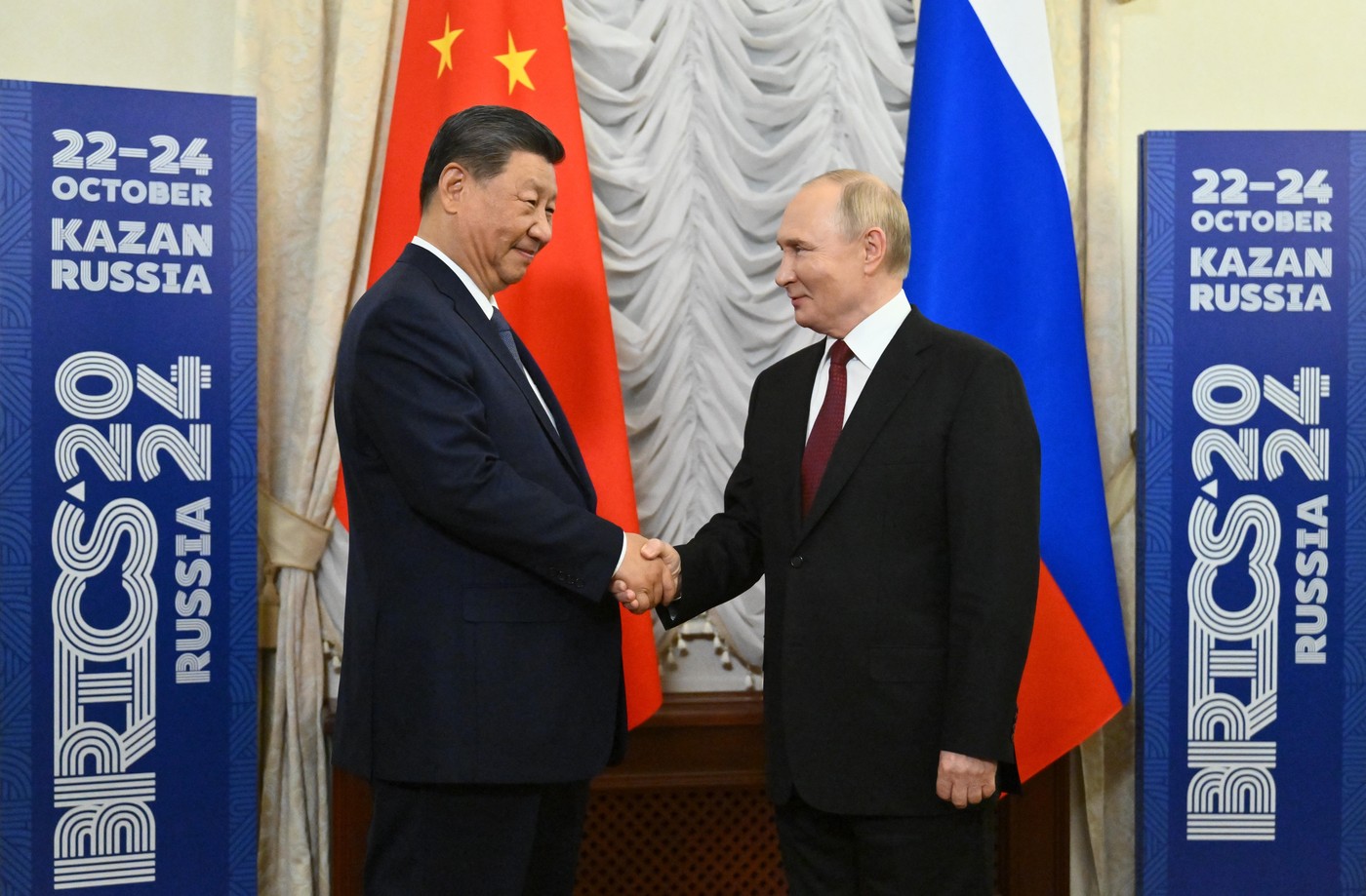 KAZAN, RUSSIA - OCTOBER 22 : (----EDITORIAL USE ONLY - MANDATORY CREDIT - 'PHOTOHOST AGENCY / KRISTINA KORMILITSYNA / HANDOUT' - NO MARKETING NO ADVERTISING CAMPAIGNS - DISTRIBUTED AS A SERVICE TO CLIENTS----) President of the Russian Federation Vladimir Putin (R) and President of China Xi Jinping (L) shake hands as they attend the 16th BRICS Summit in Kazan, Russia on October 22, 2024. Kristina Kormilitsyna/PHOTOHOST AGENCY / Anadolu/ABACAPRESS.COM,Image: 924890487, License: Rights-managed, Restrictions: ***
HANDOUT image or SOCIAL MEDIA IMAGE or FILMSTILL for EDITORIAL USE ONLY! * Please note: Fees charged by Profimedia are for the Profimedia's services only, and do not, nor are they intended to, convey to the user any ownership of Copyright or License in the material. Profimedia does not claim any ownership including but not limited to Copyright or License in the attached material. By publishing this material you (the user) expressly agree to indemnify and to hold Profimedia and its directors, shareholders and employees harmless from any loss, claims, damages, demands, expenses (including legal fees), or any causes of action or allegation against Profimedia arising out of or connected in any way with publication of the material. Profimedia does not claim any copyright or license in the attached materials. Any downloading fees charged by Profimedia are for Profimedia's services only. * Handling Fee Only 
***, Model Release: no, Credit line: AA/ABACA / Abaca Press / Profimedia