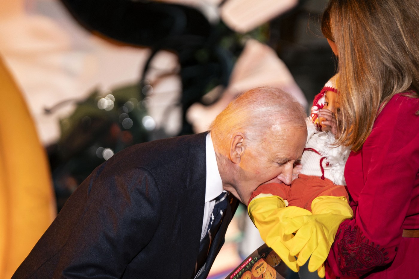 President Joe Biden playfully bites a baby during a trick-or-treating event on the South Lawn of the White House in Washington, DC on Wednesday, October 29, 2024.,Image: 928446287, License: Rights-managed, Restrictions: , Model Release: no, Credit line: Pool/ABACA / Abaca Press / Profimedia