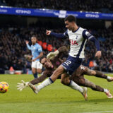 Manchester, England, 23rd November 2024. Ederson of Manchester City with Brennan Johnson of Tottenham during the Premier League match at the Etihad Stadium, Manchester. Picture credit should read: Andrew Yates / Sportimage EDITORIAL USE ONLY. No use with unauthorised audio, video, data, fixture lists, club/league logos or live services. Online in-match use limited to 120 images, no video emulation. No use in betting, games or single club/league/player publications. SPI-3466-0072