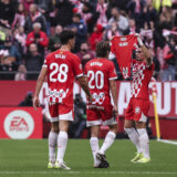 Miguel Gutierrez of Girona FC celebrates a goal shows a t-shirt in support of victims in valencia during the Spanish league, La Liga EA Sports, football match played between Girona FC and CD Leganes at Estadio de Montilivi on November 02, 2024 in Girona, Spain. AFP7 02/11/2024 (Europa Press via AP)