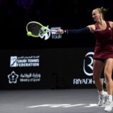 Czech Republic's Barbora Krejcikova shoots against China's Qinwen Zheng during their women's singles semi final match at King Saud University Indoor Arena, in Riyadh, Saudi Arabia, Friday, Nov. 8, 2024. (AP Photo) Saudi Arabia Tennis