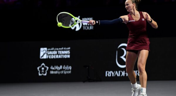 Czech Republic's Barbora Krejcikova shoots against China's Qinwen Zheng during their women's singles semi final match at King Saud University Indoor Arena, in Riyadh, Saudi Arabia, Friday, Nov. 8, 2024. (AP Photo) Saudi Arabia Tennis