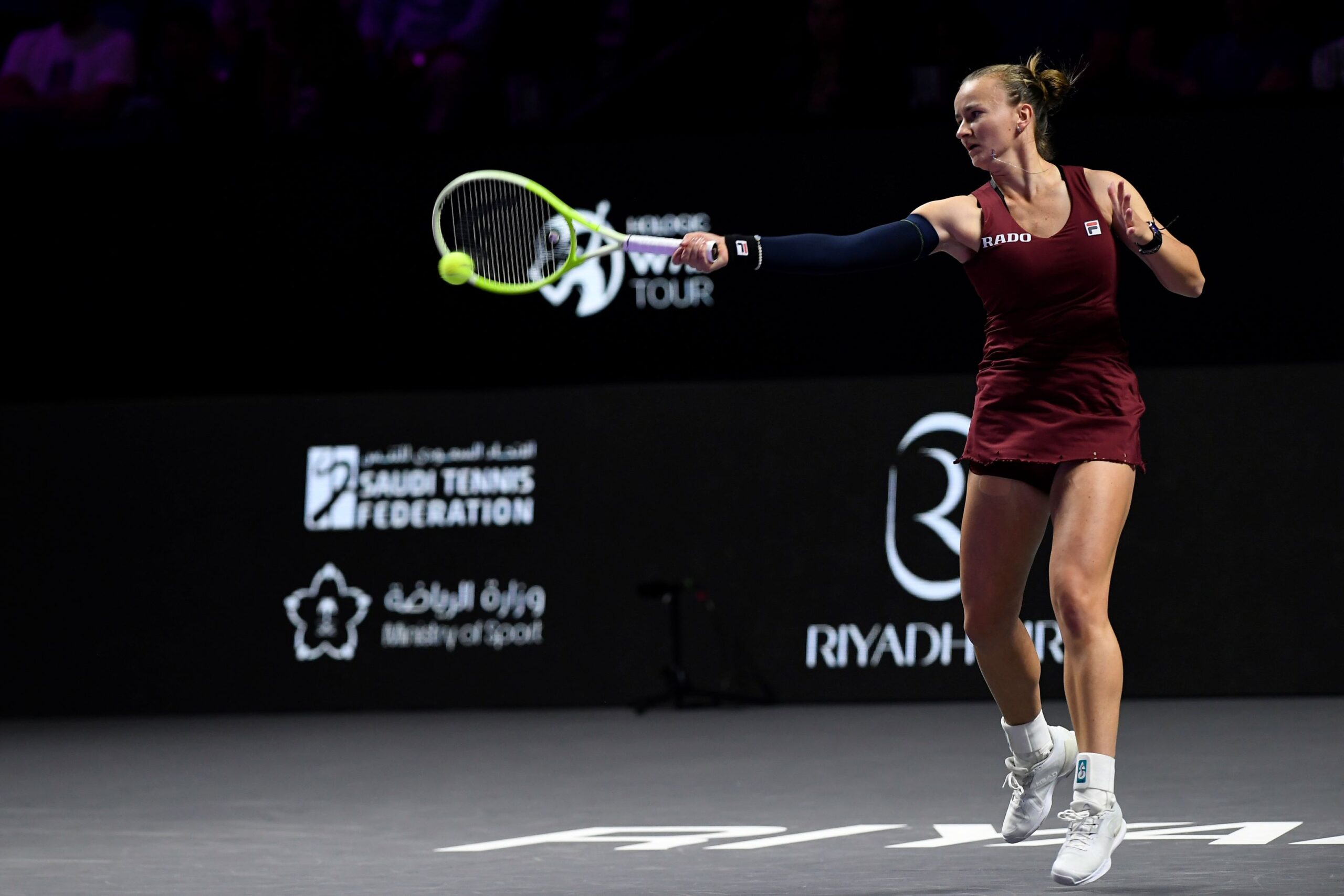 Czech Republic's Barbora Krejcikova shoots against China's Qinwen Zheng during their women's singles semi final match at King Saud University Indoor Arena, in Riyadh, Saudi Arabia, Friday, Nov. 8, 2024. (AP Photo) Saudi Arabia Tennis