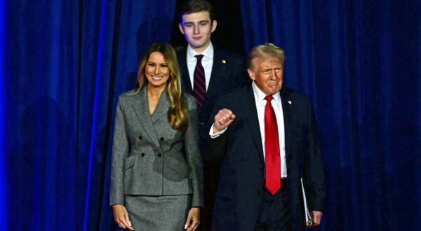 Former US President and Republican presidential candidate Donald Trump (R) arrives for  an election night event alongside former US First Lady Melania Trump and his son Barron Trump at the West Palm Beach Convention Center in West Palm Beach, Florida, on November 6, 2024.,Image: 931001090, License: Rights-managed, Restrictions: , Model Release: no, Credit line: Jim WATSON / AFP / Profimedia