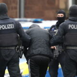 epa11671134 Federal Police officers lead the arrested Libyan suspect Omar A. (C) from a helicopter for his arraignment at the Federal Supreme Court (BGH) in Karlsruhe, Germany, 20 October 2024. According to the Federal Public Prosecutor General's Office, Omar A. is a supporter of the terrorist organization IS. Since October 2024, he intended to carry out a high-profile attack with firearms on the Israeli Embassy in Berlin. To plan the attack, the accused exchanged information with a member of the IS via a messenger chat.  EPA/RONALD WITTEK