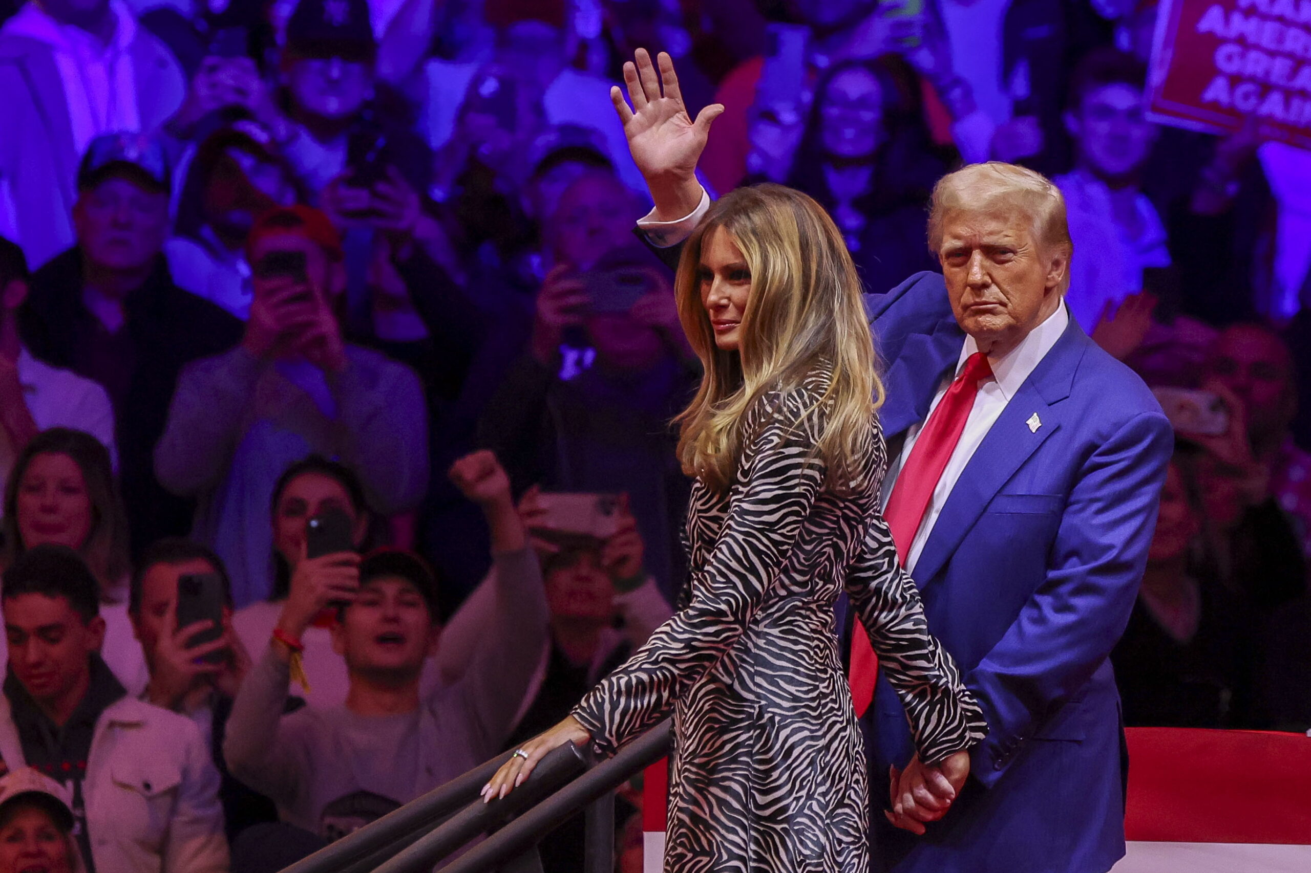 epaselect epa11688374 Former US President and Republican presidential candidate Donald Trump (R), departs with former First Lady Melania Trump (L), during a rally at Madison Square Garden in New York, New York, USA, 27 October 2024. Trump is facing US Vice President and Democratic presidential candidate Kamala Harris in the upcoming election on 05 November 2024.  EPA/SARAH YENESEL