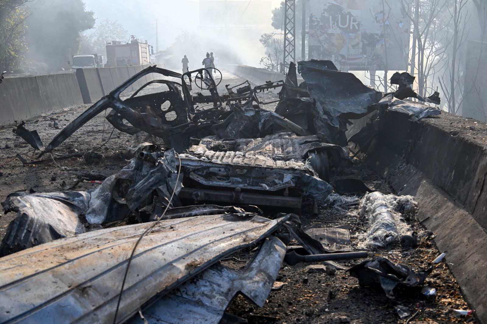 epa11692642 The wreckage of a van following an Israeli airstrike, in the town of Kahaleh, Lebanon, 30 October 2024. According to Lebanon's official National News Agency (NNA), an Israeli drone struck a van in the Araya area, setting it on fire. According to the Lebanese Ministry of Health, more than 2,700 people have been killed and over 12,700 others injured in Lebanon since the escalation in hostilities between Israel and Hezbollah.  EPA/WAEL HAMZEH