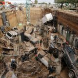 epa11696955 Civil Guard officers search for survivors inside cars trapped under the foundations of a building under construction in the town of Paiporta, Valencia, eastern Spain, 02 November 2024. According to the Integrated Operational Coordination Center (CECOPI), more than 200 people have died in Valencia and neighboring provinces after floods caused by a DANA (high-altitude isolated depression) weather phenomenon hit the east of the country. According to Spain's national weather agency (AEMET), on 29 October 2024 Valencia received a year's worth of rain, causing flash floods that destroyed homes and swept away vehicles.  EPA/Biel Alino