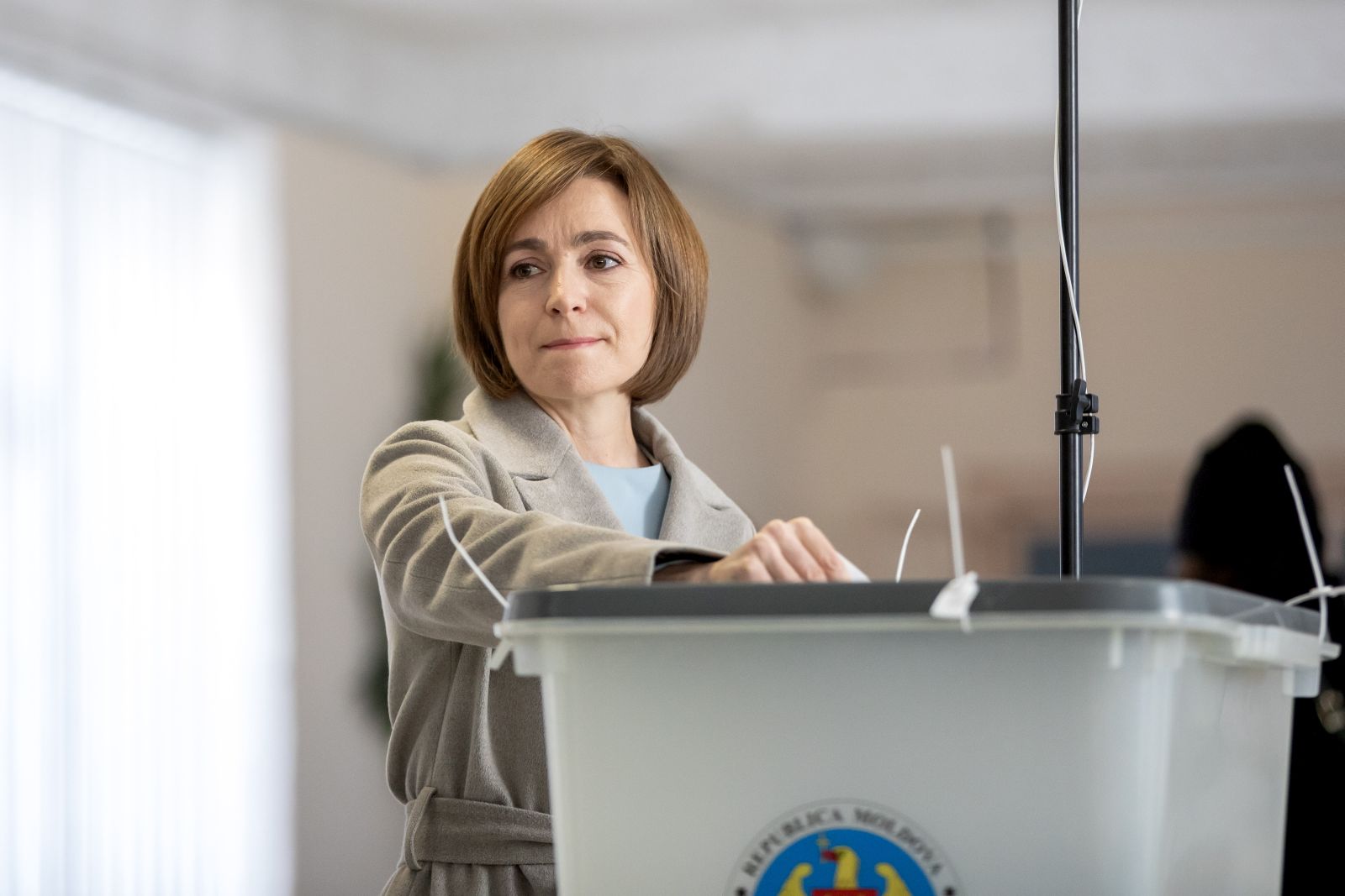 epa11698555 The incumbent President of Moldova, Maia Sandu, casts her vote at a polling station in Chisinau, Moldova, 03 November 2024. Moldova is holding second round of presidential elections, with former Attorney General of Moldova Alexandr Stoianoglo facing incumbent President of Moldova Maia Sandu.  EPA/DUMITRU DORU