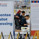 epa11701413 Workers with the Fulton County Department of Registration & Elections process absentee ballots at the county's new Elections Hub and Operations Center in Union City, Georgia, USA, 04 November 2024. Officials gave the news media a tour of the site, one day ahead of the US Election Day, 05 November 2024.  EPA/ERIK S. LESSER