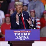 epa11702025 Republican presidential candidate and former US President Donald Trump gestures as he speaks during a campaign rally in Grand Rapids, Michigan, USA, 04 November 2024. Trump and Vice President and Democratic presidential nominee Kamala Harris are tied in the polls with one day until the election of 05 November.  EPA/CJ GUNTHER