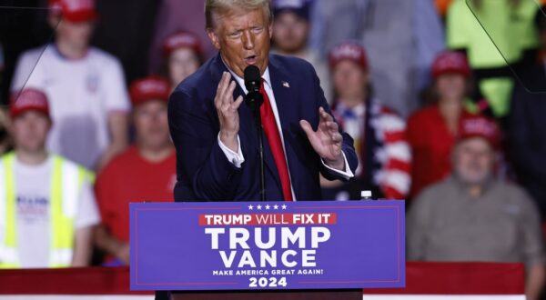 epa11702025 Republican presidential candidate and former US President Donald Trump gestures as he speaks during a campaign rally in Grand Rapids, Michigan, USA, 04 November 2024. Trump and Vice President and Democratic presidential nominee Kamala Harris are tied in the polls with one day until the election of 05 November.  EPA/CJ GUNTHER