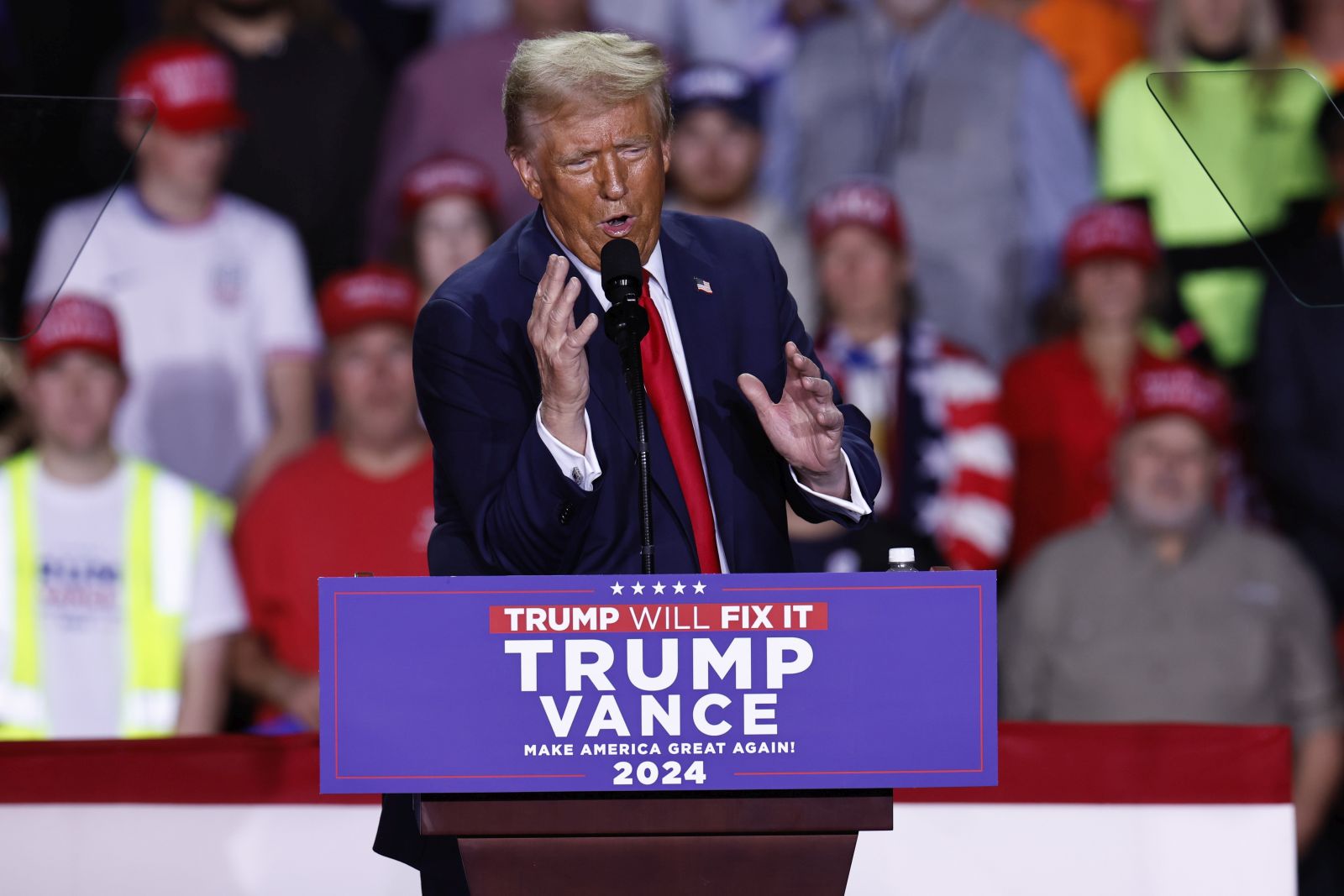 epa11702025 Republican presidential candidate and former US President Donald Trump gestures as he speaks during a campaign rally in Grand Rapids, Michigan, USA, 04 November 2024. Trump and Vice President and Democratic presidential nominee Kamala Harris are tied in the polls with one day until the election of 05 November.  EPA/CJ GUNTHER