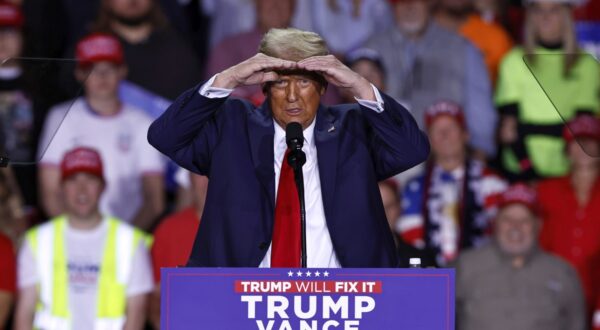 epa11701974 Republican presidential candidate and former US President Donald Trump gestures as he speaks during a campaign rally in Grand Rapids, Michigan, USA, 04 November 2024. Trump and Vice President and Democratic presidential nominee Kamala Harris are tied in the polls with one day until the election of 05 November.  EPA/CJ GUNTHER